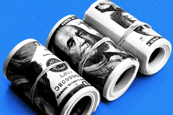 Close-up of roll of dollar bills
